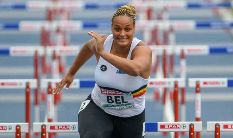 A shot putter from Belgium takes over to run 100-meter hurdles. How it saved her team is as follows: